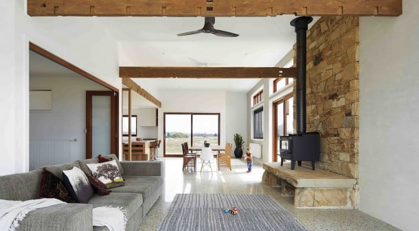 Sourcing materials locally was an important design criterion for this house – the timber beams were reclaimed from an old schoolhouse, and the chimney rock was sourced from the nearby town of Castlemaine.