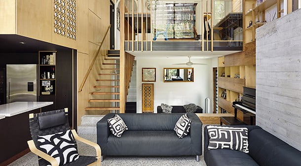 The study, sunken lounge, kitchen and jewellery box-like bedroom above the kitchen all open into the dramatic new double-height living space. The inspired split-level design provides a subtle but effective demarcation of spaces. 