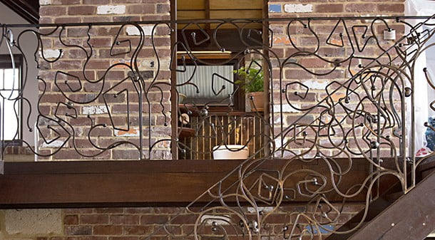 The house has a wonderful handcrafted feel with practical features such as the balustrade created as a work of art, fashioned by Wayne Murray of GWM Steel Fabrication. 