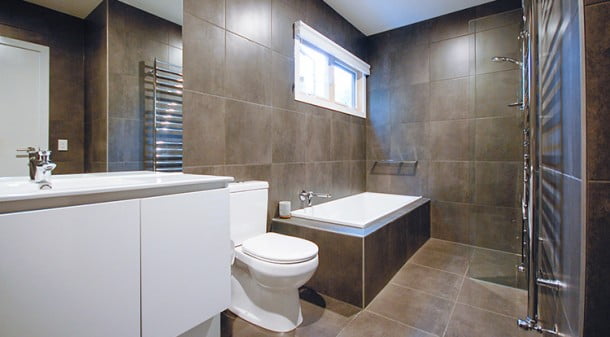 The layout of the bathroom with wet areas grouped together minimises the need for shower screens and streamlines cleaning; wide doorways and stepless thresholds makes the ground floor accessible to all.