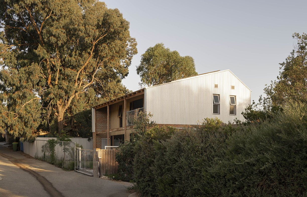 The two-storey house has been positioned on its small block to maximise northern garden space.