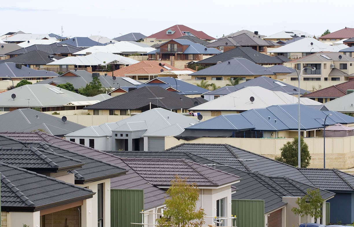 Residential houses in a Rockingham Suburb - Western Australia. Typical of modern life this new development shows suburban sprawl as a landscape of roof tops.